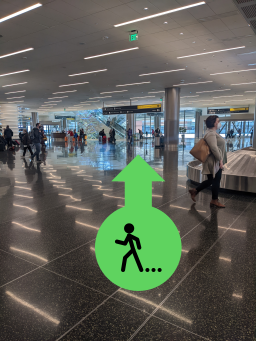 Picture at the airport with a walk arrow overlayed.